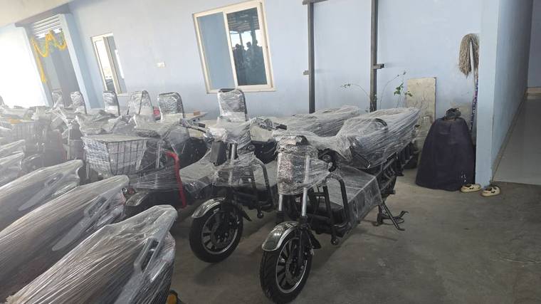 Two Excon cargo e-bikes with long load platforms